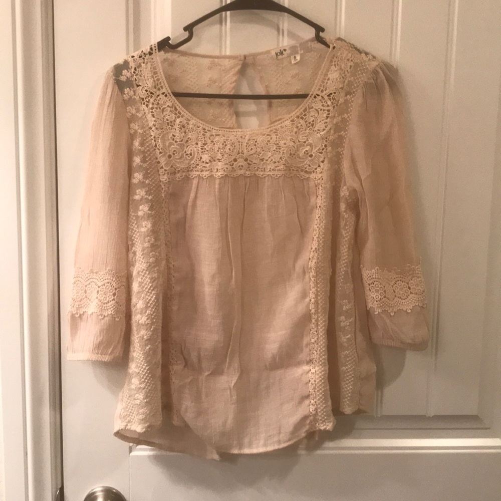 Sheer lacy cream  blouse.
